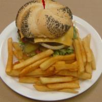 1/2 lb. Cheeseburger · 100 % fresh ground beef cheeseburger. Served with fries. Served with lettuce, tomato, grille...