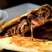 Barbacoa Quesadillas · Made with all natural 100% grass fed beef. Filled with organic pico de gallo, shredded chees...