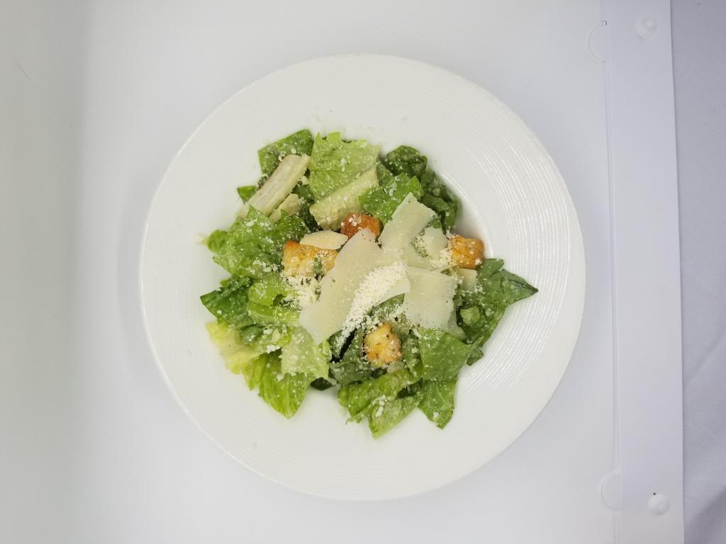 Insalata di Cesare · Caesar salad.