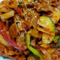 Jae Yook Bokkeum · Stir fried sliced spicy marinated Berkshire pork shoulder with scallions, onions, peppers, a...