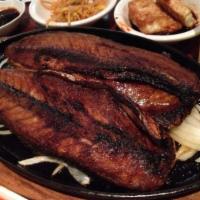 Go Deung Uh Gui · Grilled Whole Mackerel (with complimentary soup), served with pickled ginger and lemon.