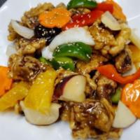 Tang Soo Yook · Deep fried diced pork with stir fried a sweet & sour sauce with mixed vegetables. Can substi...