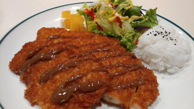 Fish Katsu · Fried breaded cutlet filet of sole fish, served with rice, donkatsu sauce, and small green salad