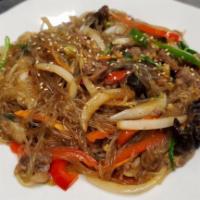 Jap Chae · Stir fried glass vermicelli noodles with vegetables, assorted mushrooms and tender morsels o...