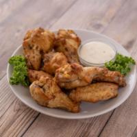 Chicken Wings · Chicken wings are bone in, fried and served with choice of sauce.