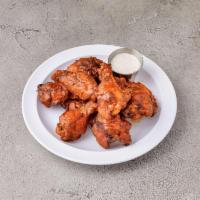 1 Dozen Buffalo Wings · 12 pieces served with blue cheese 