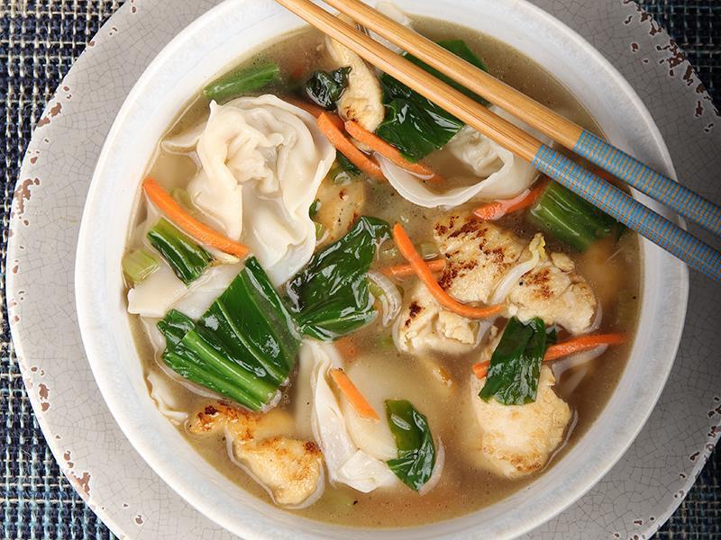 Wor Wonton Soup with Chicken · Chicken wontons with wok-seared chicken breast in rich chicken broth, scallions, carrots, and spinach.