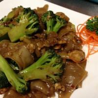 Pad See Ewe · Stir-fried fresh wide rice noodles with choice of meat, egg, broccoli, fried garlic and hous...