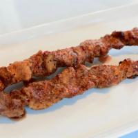 Uyghur Lamb Kabab (Per Skewer) · Chopped lamb sprinkled with cumin, house spices and sauce.