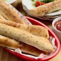 Bread Sticks · 8 pieces. Served with marinara sauce dusted with our special seasoning...