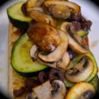 Roasted Veggies Sandwich · Roasted eggplants, zucchini, onion, bell peppers, mushrooms and melted cheese. On French rol...