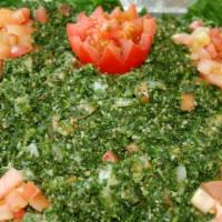 A3. Tabouleh Salad · A salad made from cracked wheat, diced tomatoes, parsley, onion, olive oil and lemon juice. ...