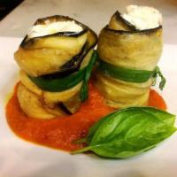 Eggplant Rollatini · Fresh breaded eggplant filled with fresh ricotta, authentic pecorino cheese with a rich toma...