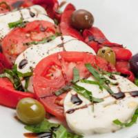 Caprese Fresh Mozzarella · Fresh house-made mozzarella, Roma tomatoes, oven-roasted peppers, fresh basil and Mediterran...