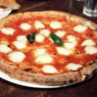 Queen Regina Pizza · Served with red sauce. Hand-crushed San Marzano, Buffalo mozzarella, basil and Parmigiano Re...