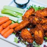 Buffalo Wings · Mild or spicy served with ranch or bleu cheese dressing.