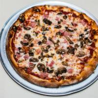 Capricciosa Pizza · Ham and mushrooms.