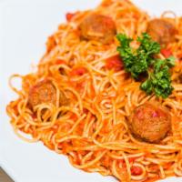 Spaghetti and Meatballs · Spaghetti in marinara sauce and meatballs. Served with garlic bread.