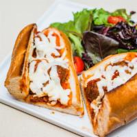 Meatball Hero Sandwich · Simple but irresistible! Meatballs, mozzarella cheese and marinara sauce. Served on choice o...