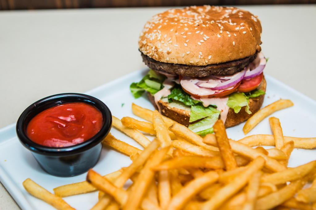 Hamburger · Fresh and juicy beef, lettuce, tomato, red onion, pickles, and panini sauce. Served with choice of french fries or house salad.