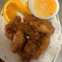 7. Chicken Wings · 8 pieces. Deep fried chicken wings served with sweet and sour sauce.