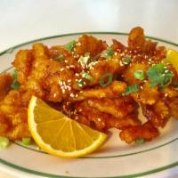 33. Orange Chicken · Deep fried tempura batter chicken with orange sauce.