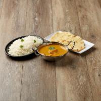 Paneer Butter Masala · Cottage cheese cubes cooked in creamy and rich butter sauce. Served with your choice of butt...