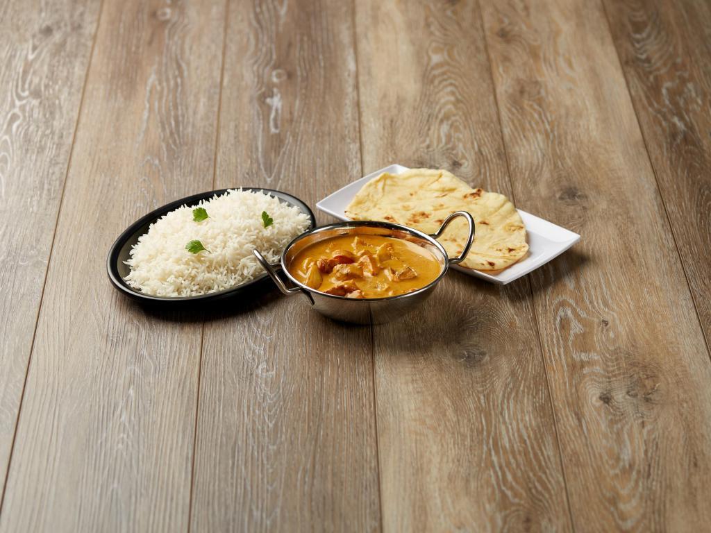 Chicken Tikka Masala · Grilled chicken chunks cooked in tomato sauce with a touch of cream. Served with your choice of butter nan or basmati rice.
