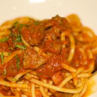 Buccatini all'Amatriciana · Imported hollow-shaped spaghetti pasta, spicy pork cheek ragu, pecorino