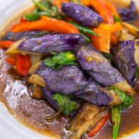 Eggplant with Yellow Sauce · Eggplant stir-fried with Thai spices and yellow bean sauce. Mild spice.