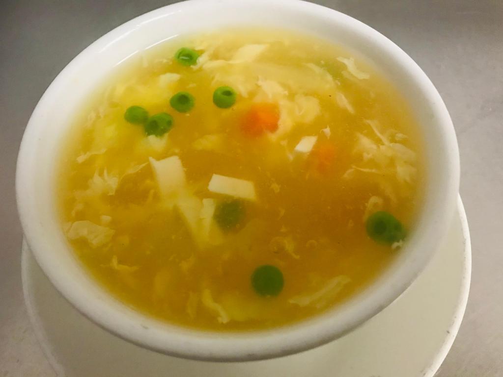 Egg Flower Soup · With vegetables and spices. Vegetarian.