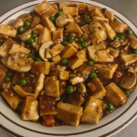 Ma Po Tofu · Stir-fried with scallions, ginger, garlic and hot sauce. Spicy. Vegetarian.