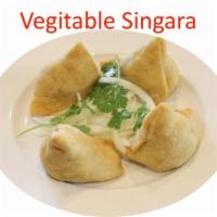 1. Vegetable Singara · 1 piece. Potatoes, green pees and spices wrapped in a homemade flour pastry dough and deep-f...