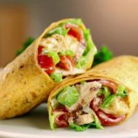 6. Chicken Wrap · Chicken cooked with onion, green paper rolled in naan bread.