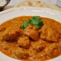 38. Chicken Masala · Tender piece of chicken slowly cooked with onion fresh herbs and ground spices.