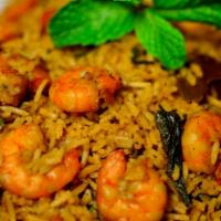 68. Shrimp Biryani · Saffron basmati rice cooked with shrimp in delicate blend of spices and herbs.