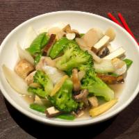 Buddha's Delight · Napa cabbage, carrots, broccoli, snow peas, mushrooms, zucchini and tofu. Served in a white ...