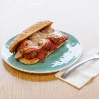 Meatball Sandwich · Meatballs, provolone, red onions and marinara sauce. Comes toasted with chips.