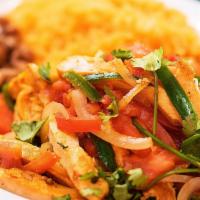 Pollo a la Mexicana Platillo · Grilled all-white meat chicken, accompanied with onions, tomatoes, Serrano peppers and fresh...