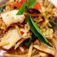 Pad Kra Prow · Basil leaves. A choice of meat sauteed with bamboo shoots, fresh basil leaves and Thai chili...