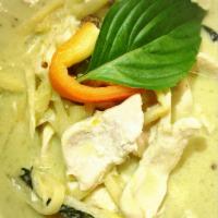 Green Curry · Zesty Thai herbs green curry paste with coconut milk simmer with choice of meat and bamboo s...