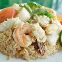 D-Day Seafood Fried Rice · Crabmeat and combination seafood stir fried with egg, onion, tomato and spring onion in our ...
