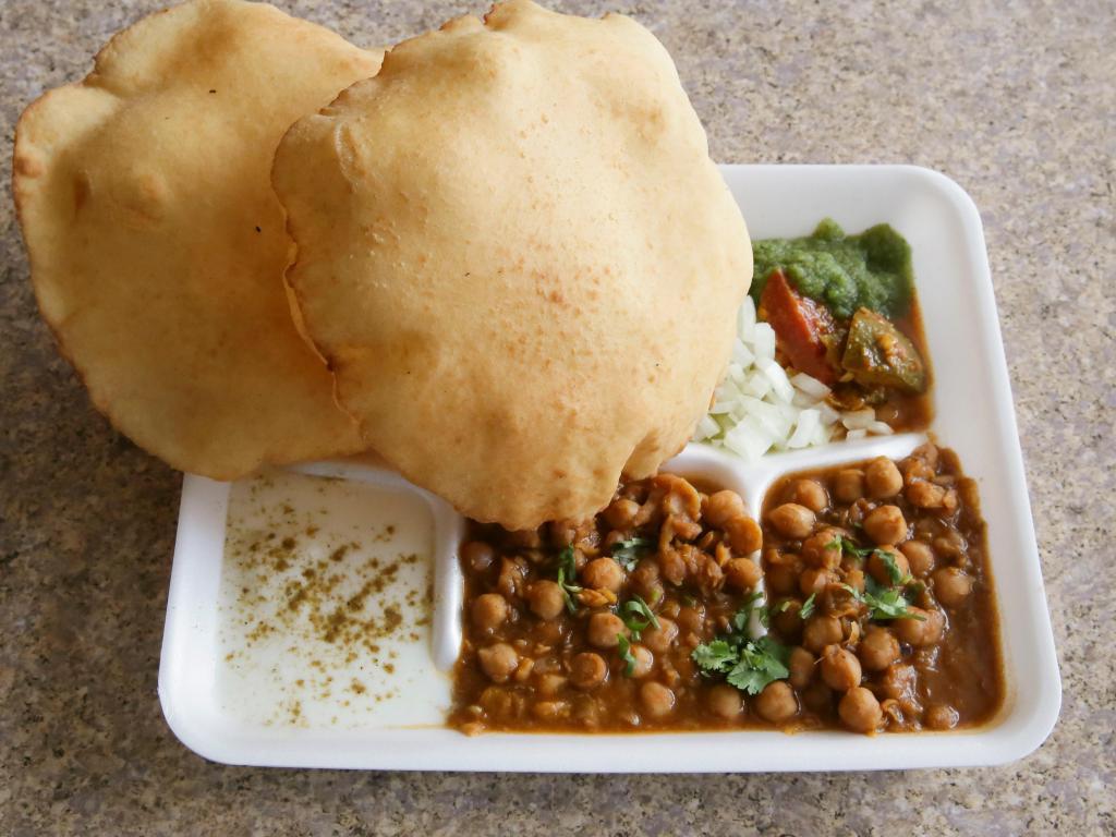21. Choley Bhature Value Meal · A combination of 2 bhature served with channa masala and yogurt.
