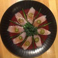 Jalapeno Hamachi · Raw. Thin slice yellowtail sashimi with jalapeno, topped with hot sauce and ponzu sauce.