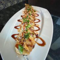 Las Vegas Roll · Lightly Fried with Smoked Salmon, Cream Cheese, Crab Meat. Drizzled with spicy mayo and eel ...