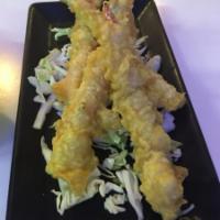 393141. Four Pieces Shrimp Tempura · Deep fried tempuras-battered shrimp.