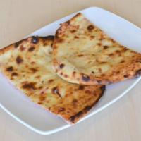 Kabuli Naan (Sweet Bread) · Naan stuffed with cherries, cashew powder, coconut