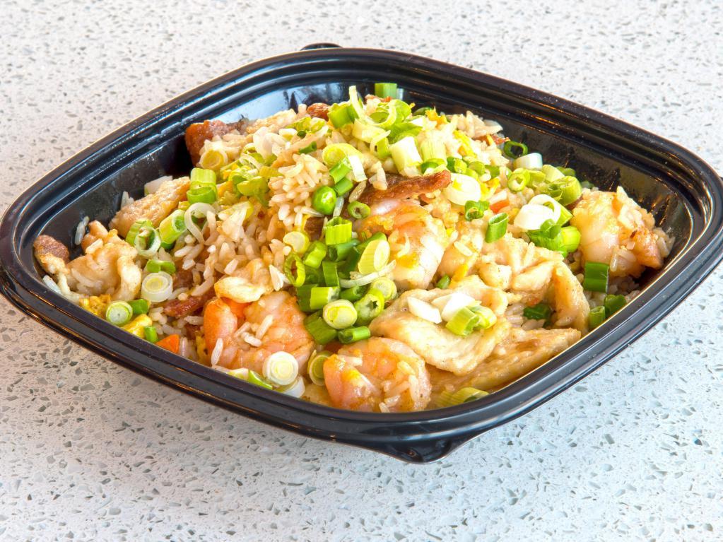 House Special Fried Rice · Shrimp, chicken and tender beef tossed with vegetable egg fried rice. (vegetable : green pea and carrot) Quart size. Feeds 2-3 people.
