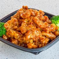 Orange Chicken (Mild Spicy) · chicken tossed in a sweet and spicy orange sauce. Quart size. Feeds 2-3 people. Served with ...