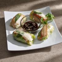A8. Freshy Rolls · 4 rolls of noodles, soy chicken, romaine lettuce, bean sprouts, and fresh herbs, wrapped wit...